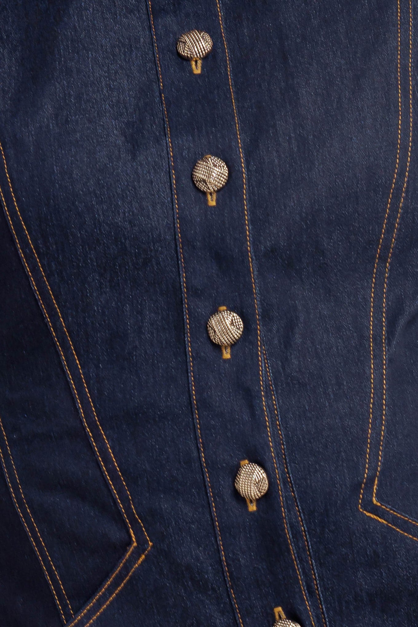 A denim mini dress featuring collar, sleeveless and front button down closure