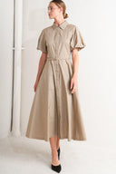 A striped woven midi dress featuring collar, raglan short puff sleeve, hidden button down, self belt and circle skirt