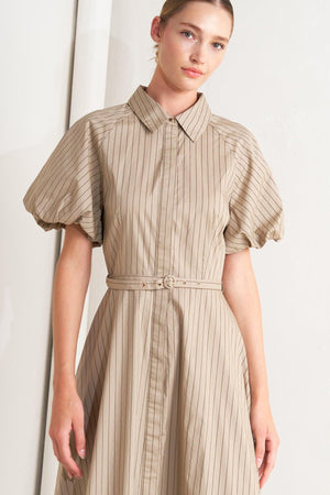 A striped woven midi dress featuring collar, raglan short puff sleeve, hidden button down, self belt and circle skirt