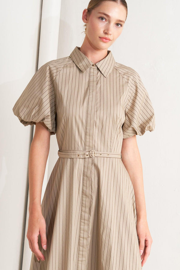 A striped woven midi dress featuring collar, raglan short puff sleeve, hidden button down, self belt and circle skirt