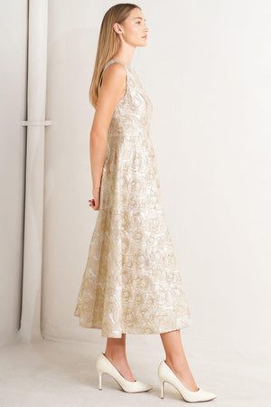 A textured woven midi dress featuring wide neckline, sleeveless, circle skirt and back zipper closure