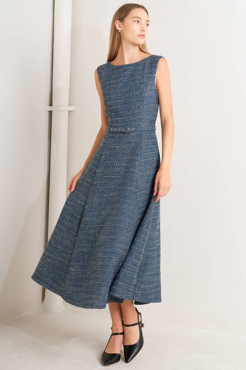 A woven tweed midi dress featuring round neckline, sleeveless, self belt, circle skirt and back zipper closure