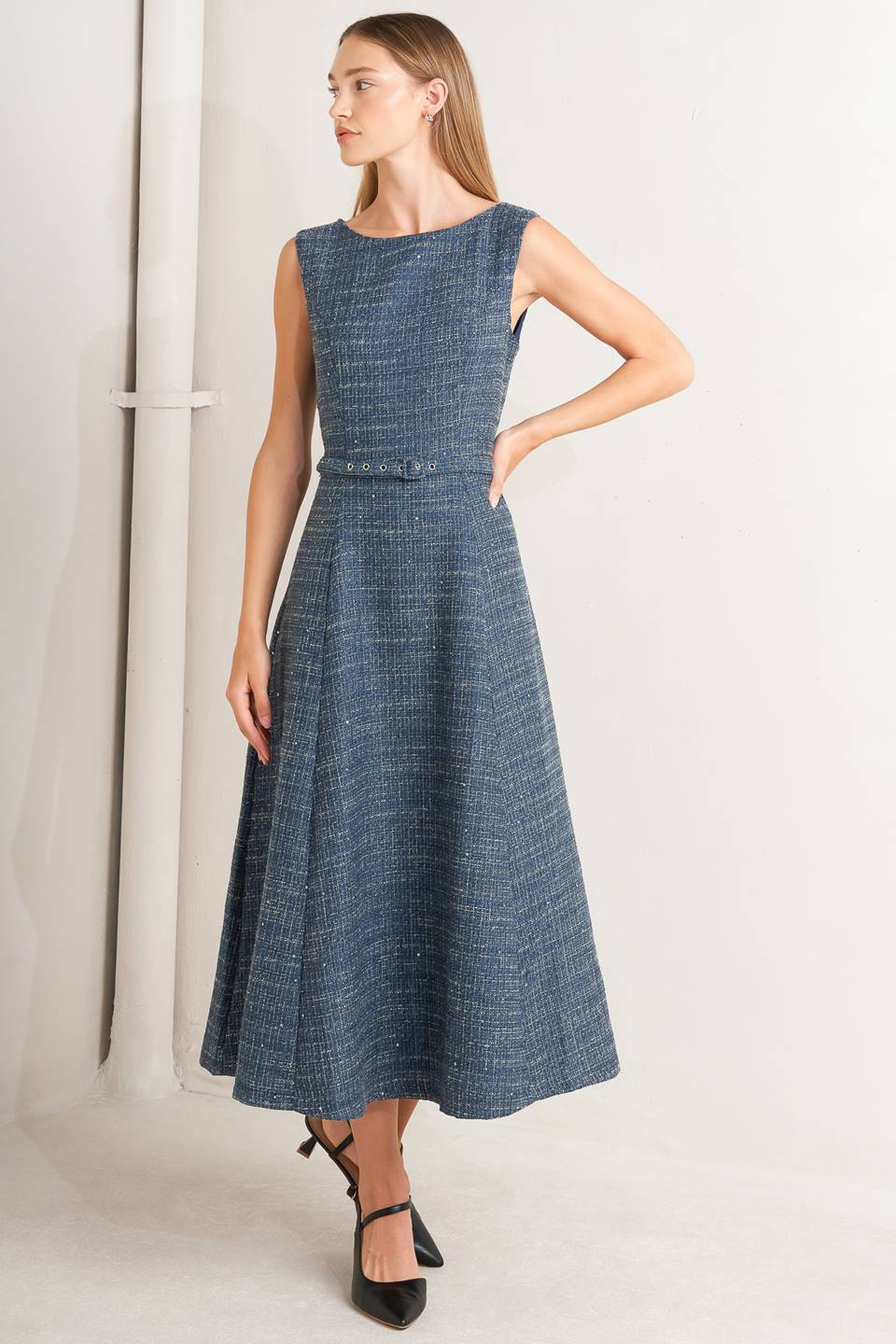 A woven tweed midi dress featuring round neckline, sleeveless, self belt, circle skirt and back zipper closure