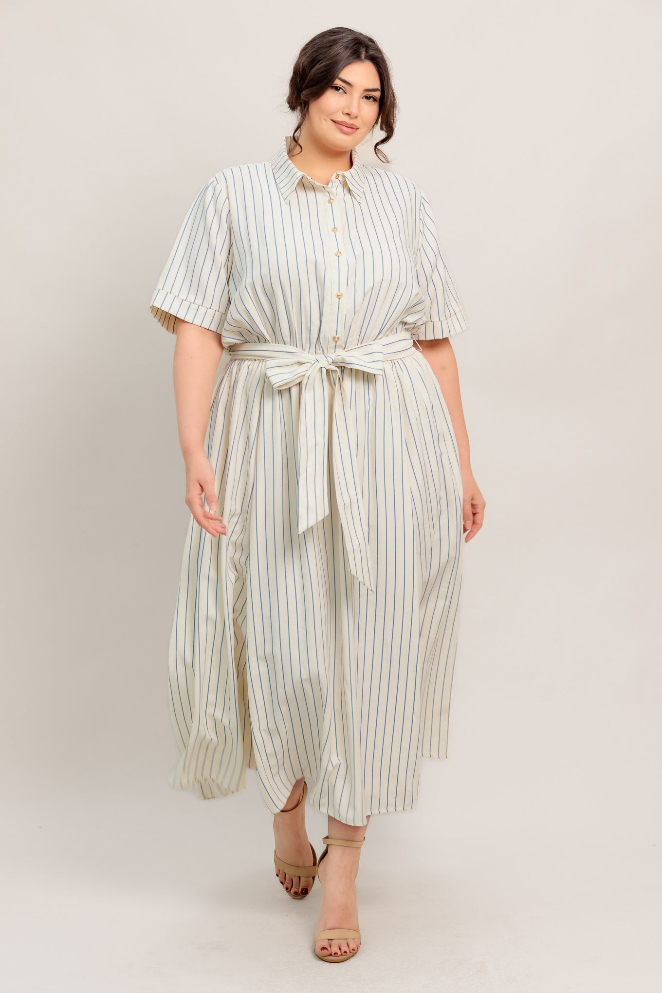 
A striped woven midi dress featuring collar, button down bodice, short sleeve, elasticized waist with tie and full skirt

Details:

Self : 65% Polyester 35% Cotton

Size &amp; Fit

- Model is 5`8" And Wearing Size Small
- Measurements Taken From Size Small
- Approx. Length: 51" Flying Tomato