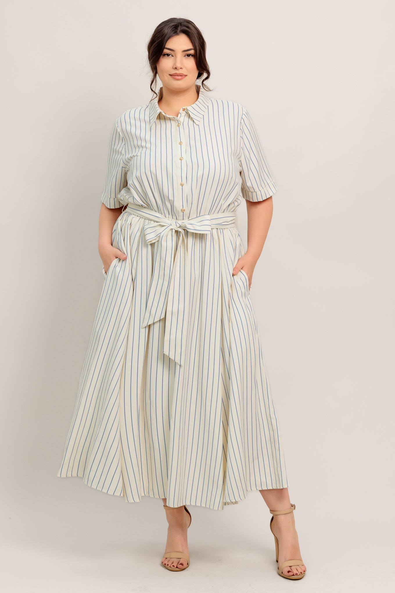 
A striped woven midi dress featuring collar, button down bodice, short sleeve, elasticized waist with tie and full skirt

Details:

Self : 65% Polyester 35% Cotton

Size &amp; Fit

- Model is 5`8" And Wearing Size Small
- Measurements Taken From Size Small
- Approx. Length: 51" Flying Tomato