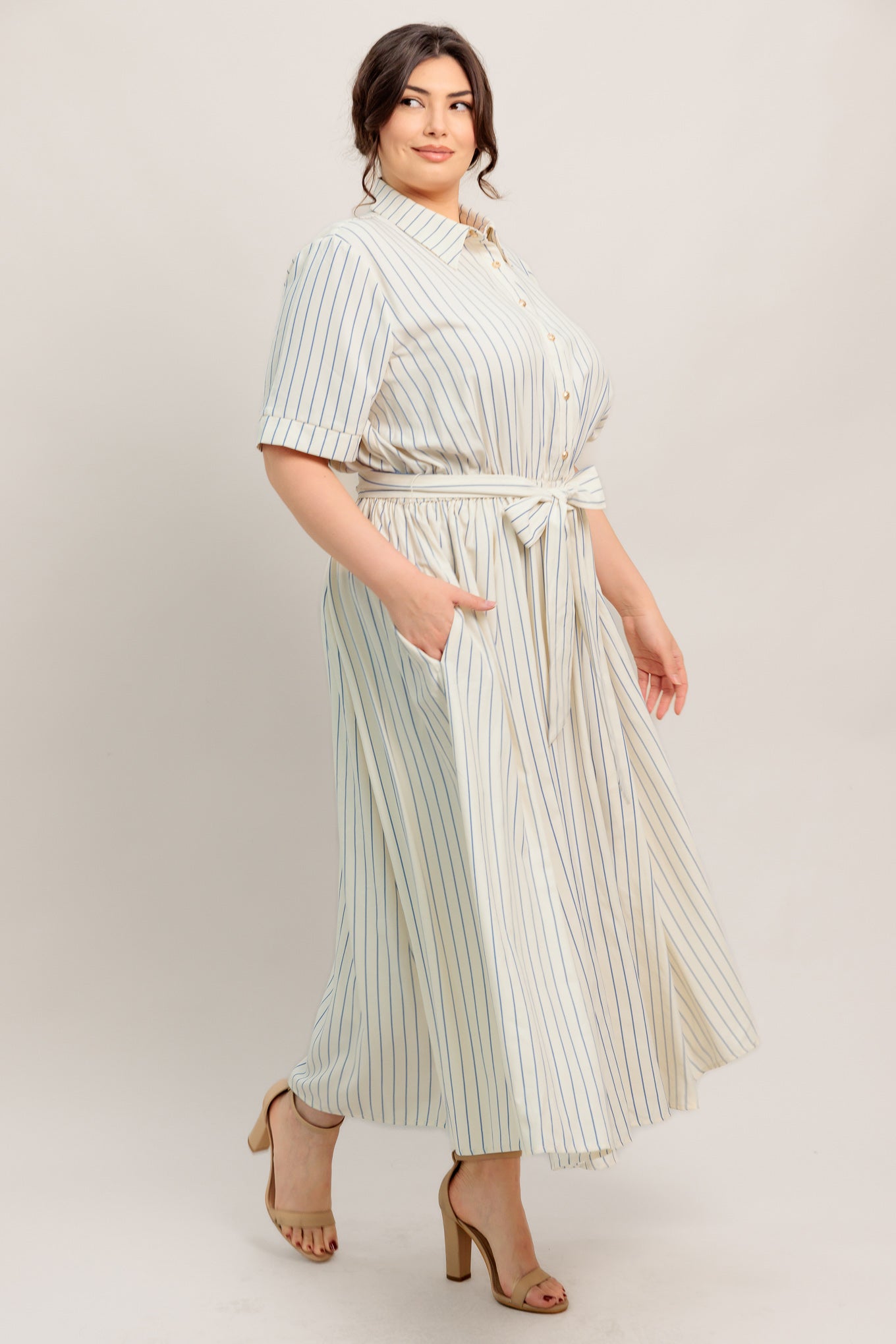 
A striped woven midi dress featuring collar, button down bodice, short sleeve, elasticized waist with tie and full skirt

Details:

Self : 65% Polyester 35% Cotton

Size &amp; Fit

- Model is 5`8" And Wearing Size Small
- Measurements Taken From Size Small
- Approx. Length: 51" Flying Tomato