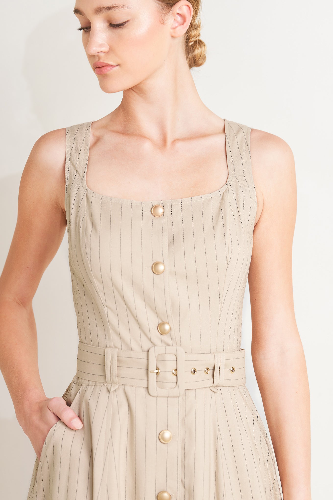 
A striped woven midi dress featuring square neckline, sleeveless, button down, self belt and circle skirt

Details:

Self : 65% Rayon 30% Linen 5% Polyester
Lining : 90% Polyester 10% Cotton

Size &amp; Fit

- Model is 5`8" And Wearing Size Small
- Measurements Taken From Size Small
- Approx. Length: 51"