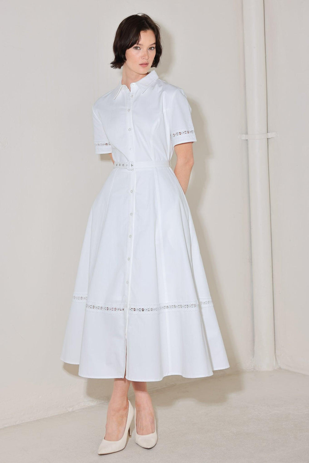 
A solid woven midi dress featuring collar, short sleeve with lace inset, front button down, self belt, circle skirt with lace inset bottom

Details:

Self : 100% Cotton
Lining : 100% Polyester

Size &amp; Fit

- Model is 5`8" And Wearing Size Small
- Measurements Taken From Size Small
- Approx. Length: 50"