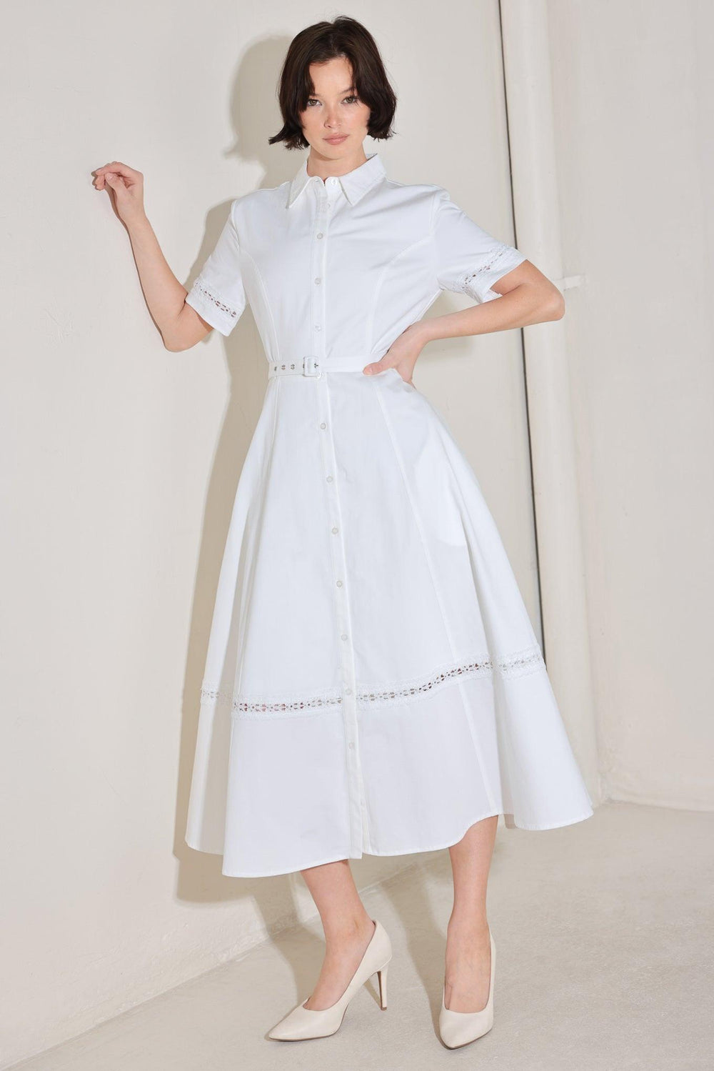 
A solid woven midi dress featuring collar, short sleeve with lace inset, front button down, self belt, circle skirt with lace inset bottom

Details:

Self : 100% Cotton
Lining : 100% Polyester

Size &amp; Fit

- Model is 5`8" And Wearing Size Small
- Measurements Taken From Size Small
- Approx. Length: 50"