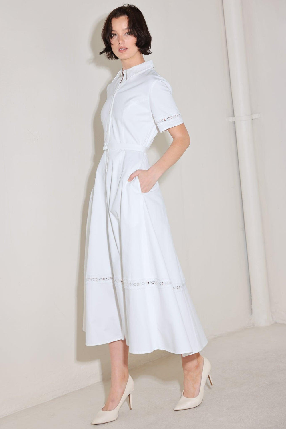 
A solid woven midi dress featuring collar, short sleeve with lace inset, front button down, self belt, circle skirt with lace inset bottom

Details:

Self : 100% Cotton
Lining : 100% Polyester

Size &amp; Fit

- Model is 5`8" And Wearing Size Small
- Measurements Taken From Size Small
- Approx. Length: 50"