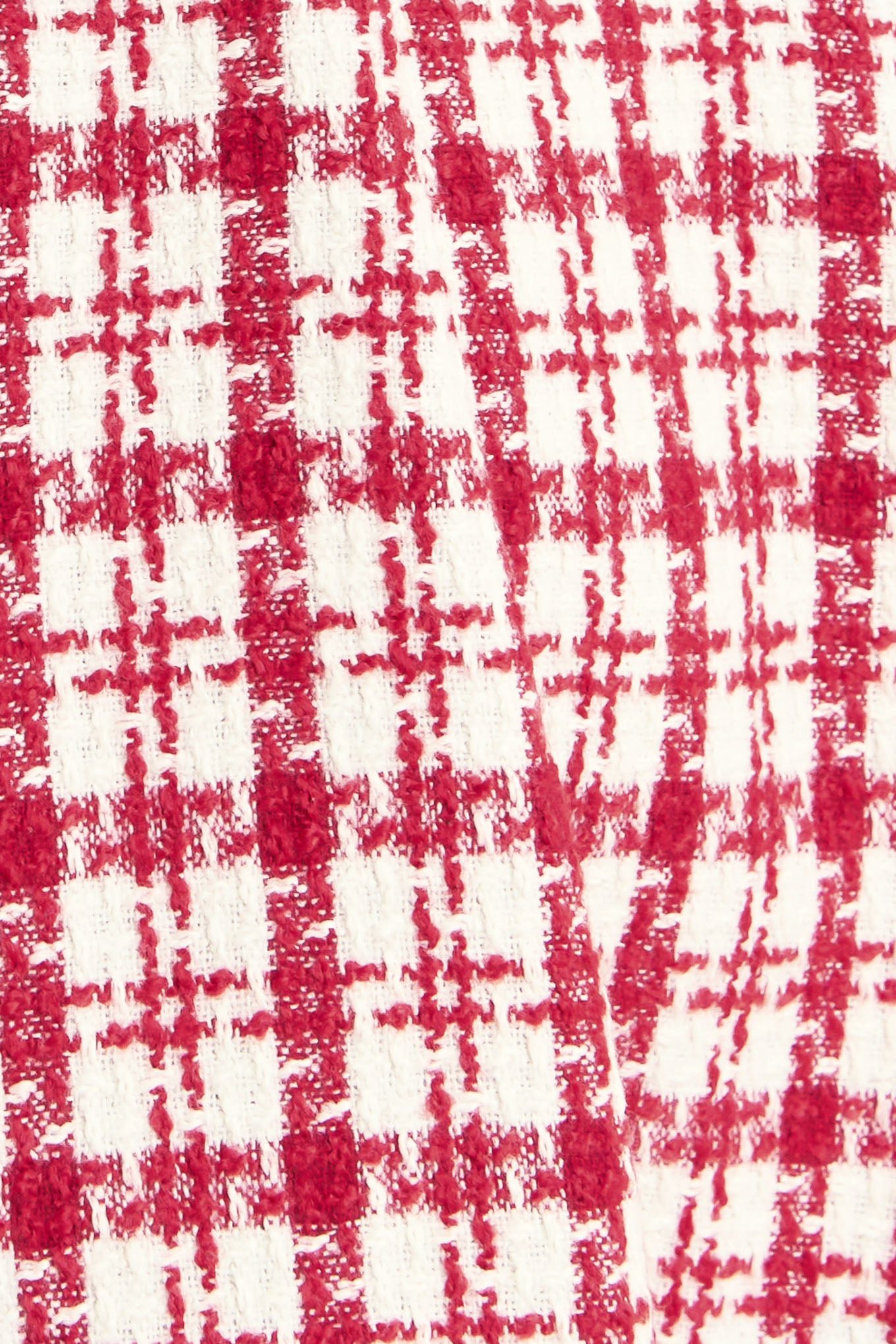 A tweed mini dress featuring strapless, self belt, circle skirt and back zipper closure