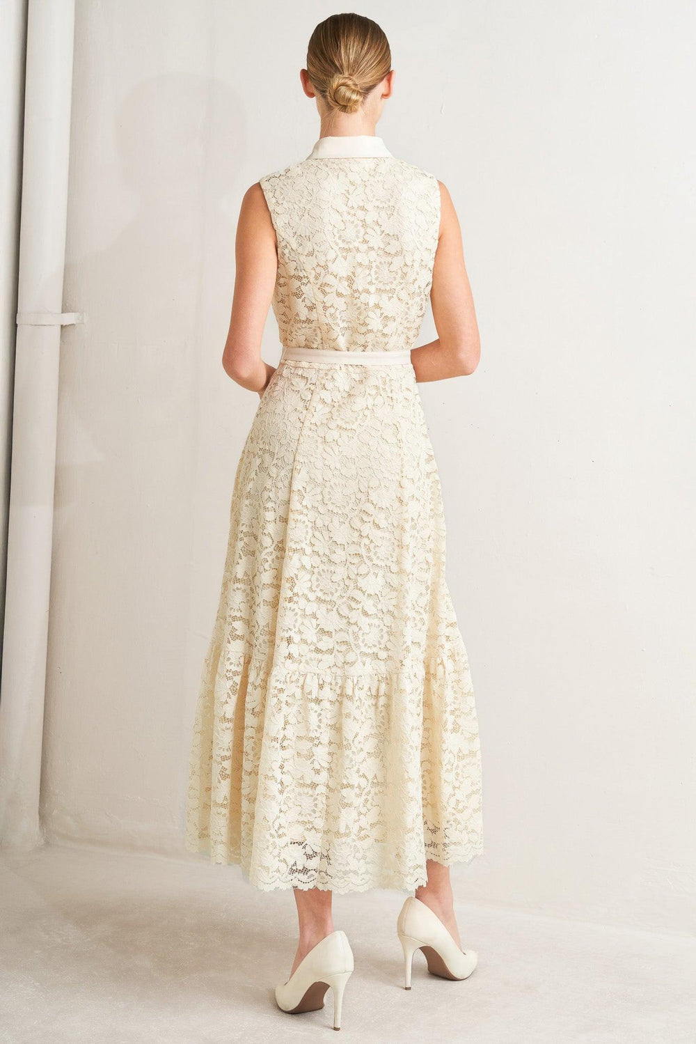 A woven lace midi dress featuring contrasting collar, placket and belt, sleeveless, button down and ruffle hem

Details:

Self: 65% Cotton 35% Nylon

Contrast: 100% Polyester

Lining: 100% Polyester

Size & Fit

-Model is 5`8" And Wearing Size Small
-Measurements Taken From Size Small
-Approx. Length: 52"