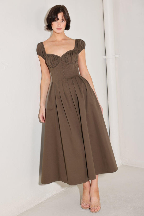 
A solid woven midi dress featuring sweetheart neckline, short sleeve, ruched bust, front button detail, full skirt and back zipper closure

Details:

Self : 100% Cotton

Size &amp; Fit

- Model is 5`8" And Wearing Size Small
- Measurements Taken From Size Small
- Approx. Length: 50"
