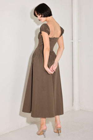 
A solid woven midi dress featuring sweetheart neckline, short sleeve, ruched bust, front button detail, full skirt and back zipper closure

Details:

Self : 100% Cotton

Size &amp; Fit

- Model is 5`8" And Wearing Size Small
- Measurements Taken From Size Small
- Approx. Length: 50"