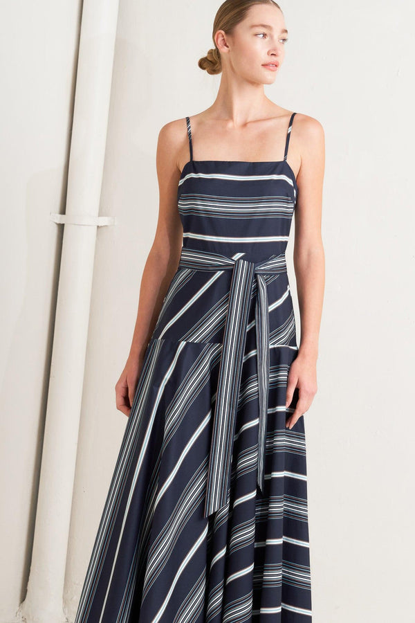 
A striped woven midi dress featuring straight neckline, straps, self sash tie, circle skirt and back zipper closure

Details:

Self : 100% Cotton

Size &amp; Fit

- Model is 5`8" And Wearing Size Small
- Measurements Taken From Size Small
- Approx. Length: 53" Flying Tomato