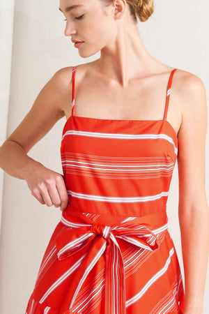 
A striped woven midi dress featuring straight neckline, straps, self sash tie, circle skirt and back zipper closure

Details:

Self : 100% Cotton

Size &amp; Fit

- Model is 5`8" And Wearing Size Small
- Measurements Taken From Size Small
- Approx. Length: 53" Flying Tomato