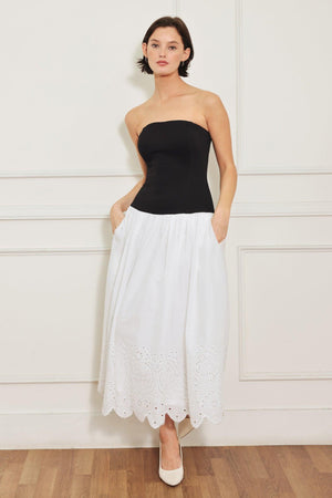 
A knit/woven combination midi dress featuring strapless knit top, woven eyelet full skirt and back zipper closure

Details:

Self : 100% Cotton
Contrast : 49% Rayon 44% Polyester 7% Spandex
Lining : 100% Polyester

Size &amp; Fit

- Model is 5`8" And Wearing Size Small
- Measurements Taken From Size Small
- Approx. Length: 43"