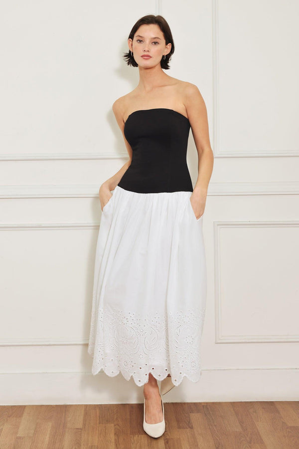 
A knit/woven combination midi dress featuring strapless knit top, woven eyelet full skirt and back zipper closure

Details:

Self : 100% Cotton
Contrast : 49% Rayon 44% Polyester 7% Spandex
Lining : 100% Polyester

Size &amp; Fit

- Model is 5`8" And Wearing Size Small
- Measurements Taken From Size Small
- Approx. Length: 43"