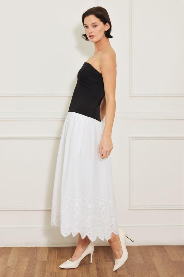 
A knit/woven combination midi dress featuring strapless knit top, woven eyelet full skirt and back zipper closure

Details:

Self : 100% Cotton
Contrast : 49% Rayon 44% Polyester 7% Spandex
Lining : 100% Polyester

Size &amp; Fit

- Model is 5`8" And Wearing Size Small
- Measurements Taken From Size Small
- Approx. Length: 43"