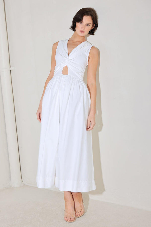 
A solid midi dress featuring knit top with V neckline, sleeveless, twist front detail with cut out, full woven skirt and back zipper closure

Details:

Self : 100% Cotton
Contrast : 96% Cotton 4% Spandex
Lining : 100% Polyester

Size &amp; Fit

- Model is 5`8" And Wearing Size Small
- Measurements Taken From Size Small
- Approx. Length: 52"