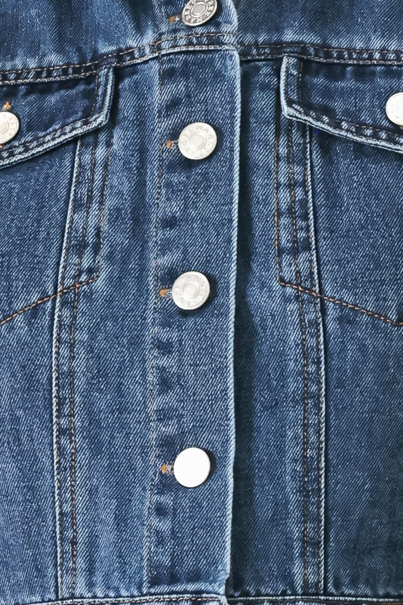 A washed denim mini dress featuring collar, short sleeve, front pockets, front button down and circle skirt