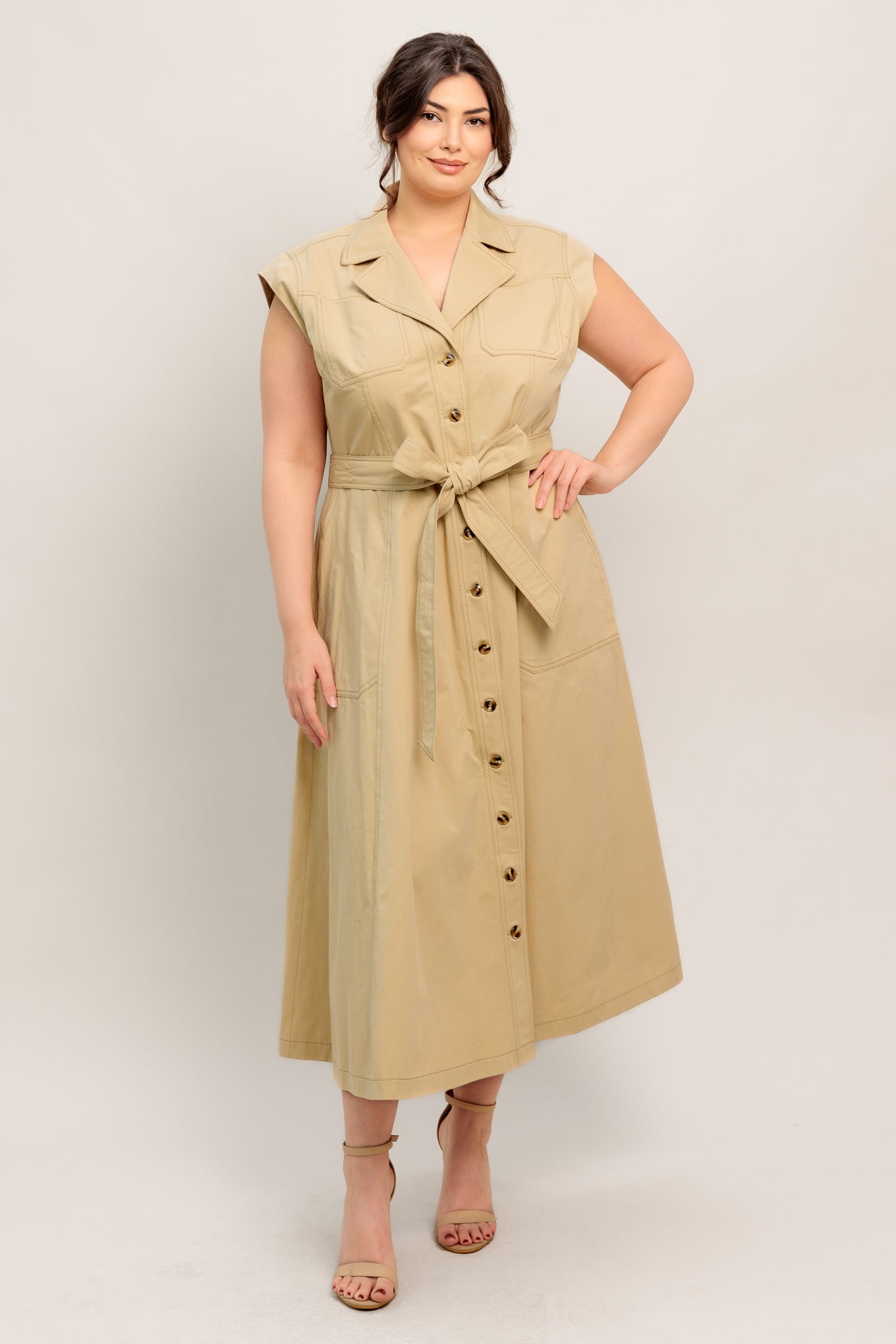 
A solid woven midi dress featuring collar, cap sleeve, pockets, button down, self sash tie and circle skirt

Details:

Self : 100% Cotton

Size &amp; Fit

- Model is 5`8" And Wearing Size Small
- Measurements Taken From Size Small
- Approx. Length: 49"