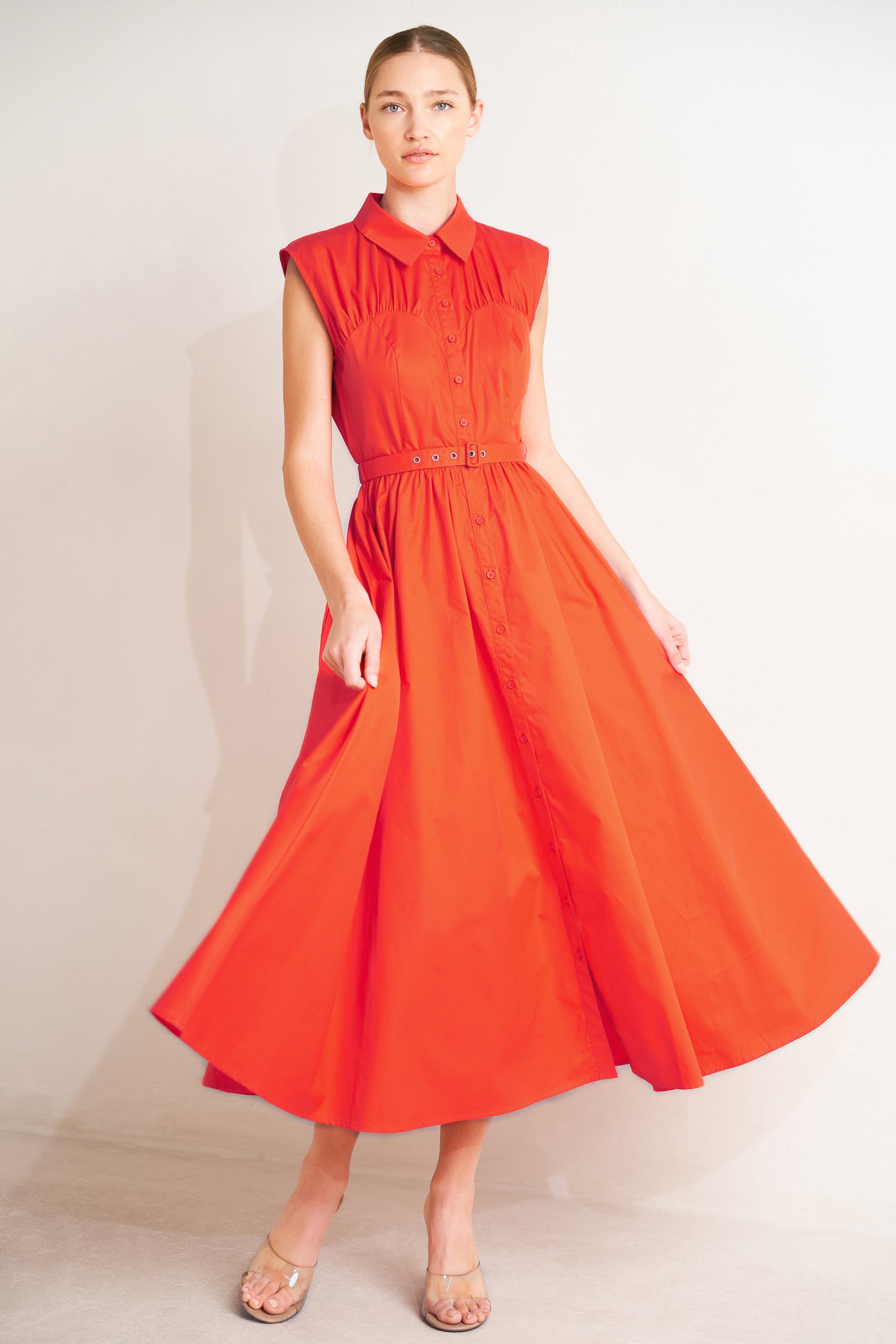 
A solid woven midi dress featuring collar, sleeveless, bustier silhouette, button down, self belt and full skirt

Details:

Self : 100% Cotton

Size &amp; Fit

- Model is 5`8" And Wearing Size Small
- Measurements Taken From Size Small
- Approx. Length: 50"