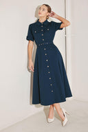 CLASSIC AUTHORITY WOVEN MIDI DRESS.