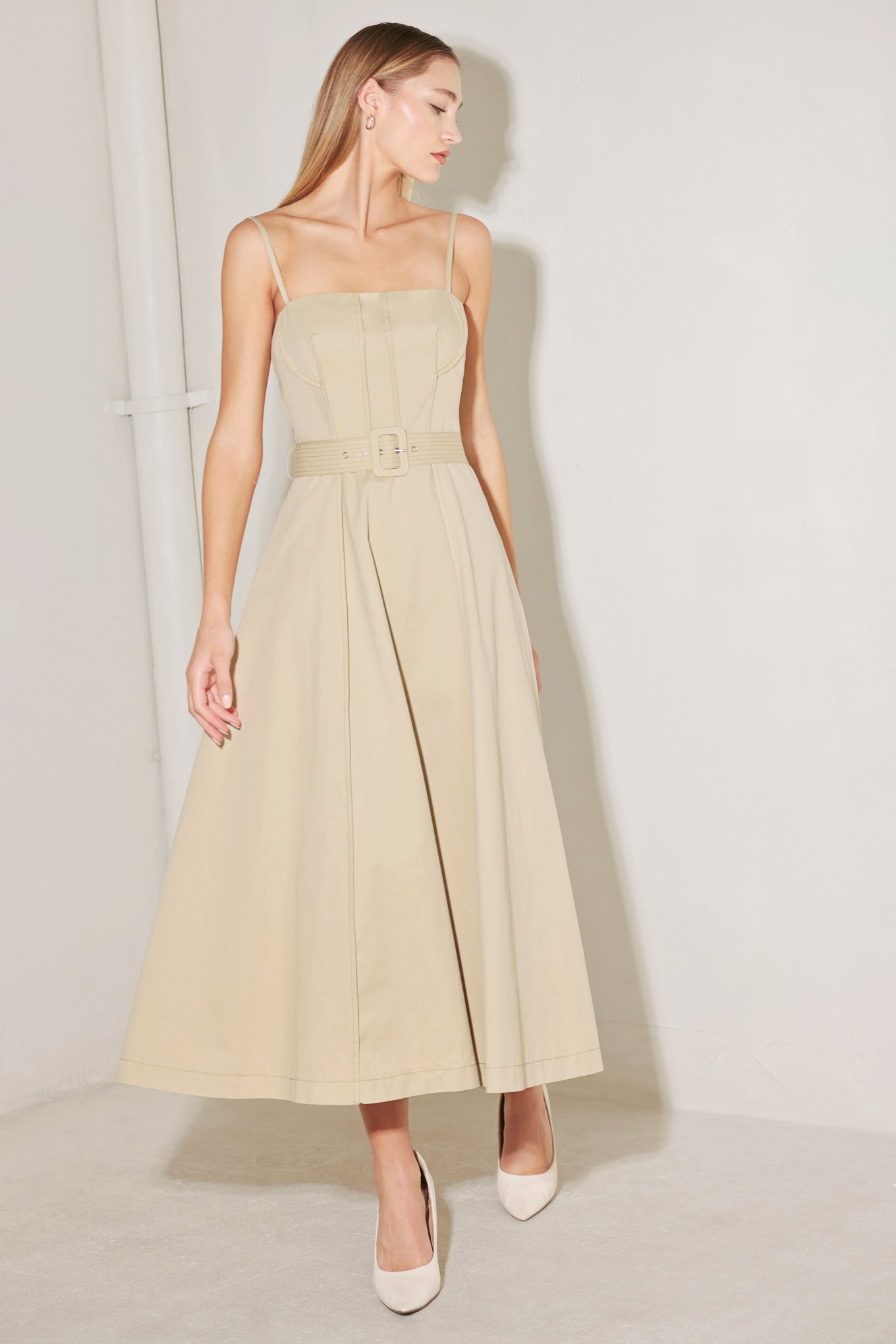 
A solid woven midi dress featuring straight neckline, straps, self belt, circle skirt and back zipper closure

Details:

Self : 100% Cotton

Size &amp; Fit

- Model is 5`8" And Wearing Size Small
- Measurements Taken From Size Small
- Approx. Length: 50"