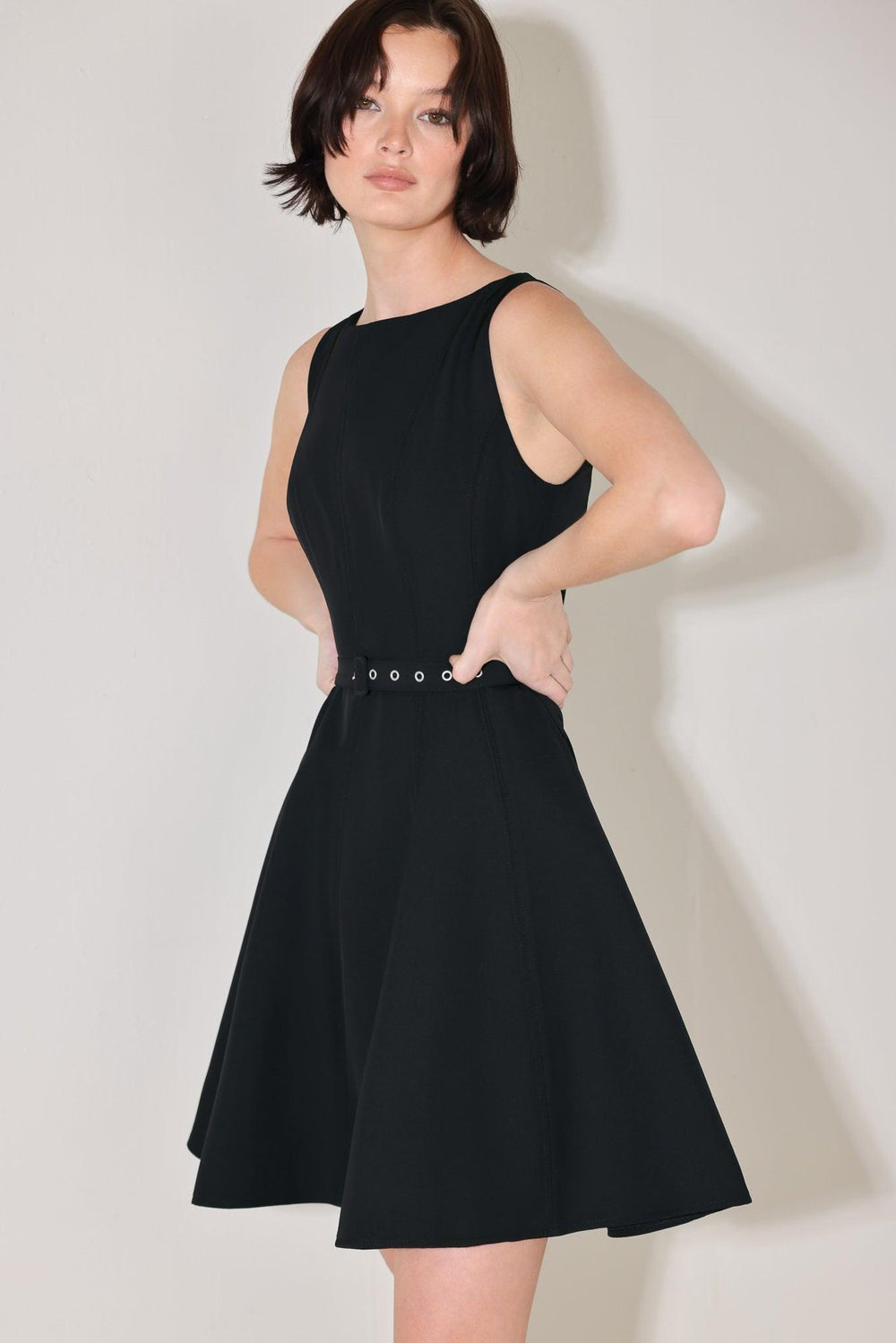 
A solid woven mini dress featuring wide neckline, sleeveless, self belt, circle skirt and back zipper closure

Details:

Self : 95% Polyester 5% Spandex

Size &amp; Fit

- Model is 5`8" And Wearing Size Small
- Measurements Taken From Size Small
- Approx. Length: 36"