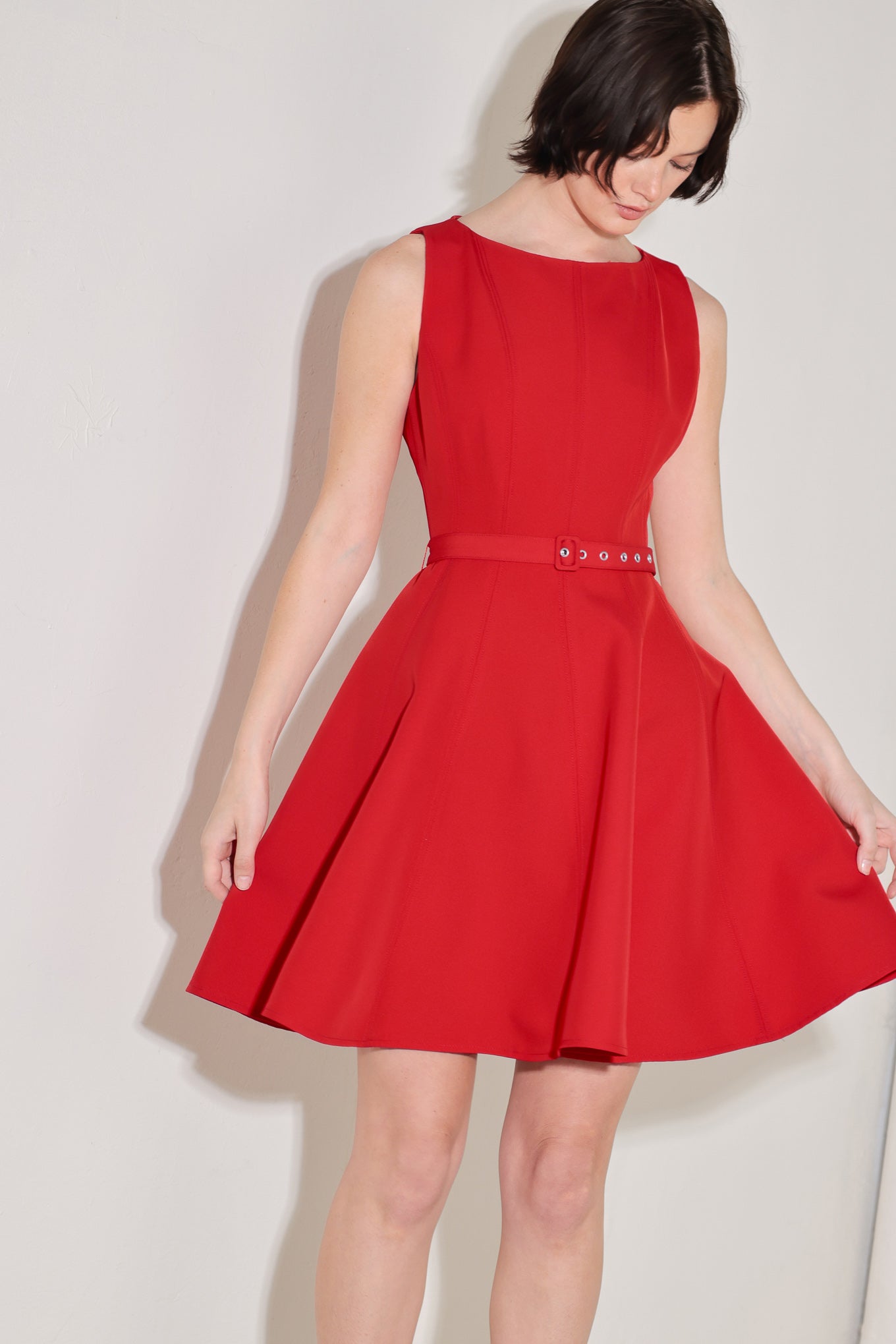 
A solid woven mini dress featuring wide neckline, sleeveless, self belt, circle skirt and back zipper closure

Details:

Self : 95% Polyester 5% Spandex

Size &amp; Fit

- Model is 5`8" And Wearing Size Small
- Measurements Taken From Size Small
- Approx. Length: 36"