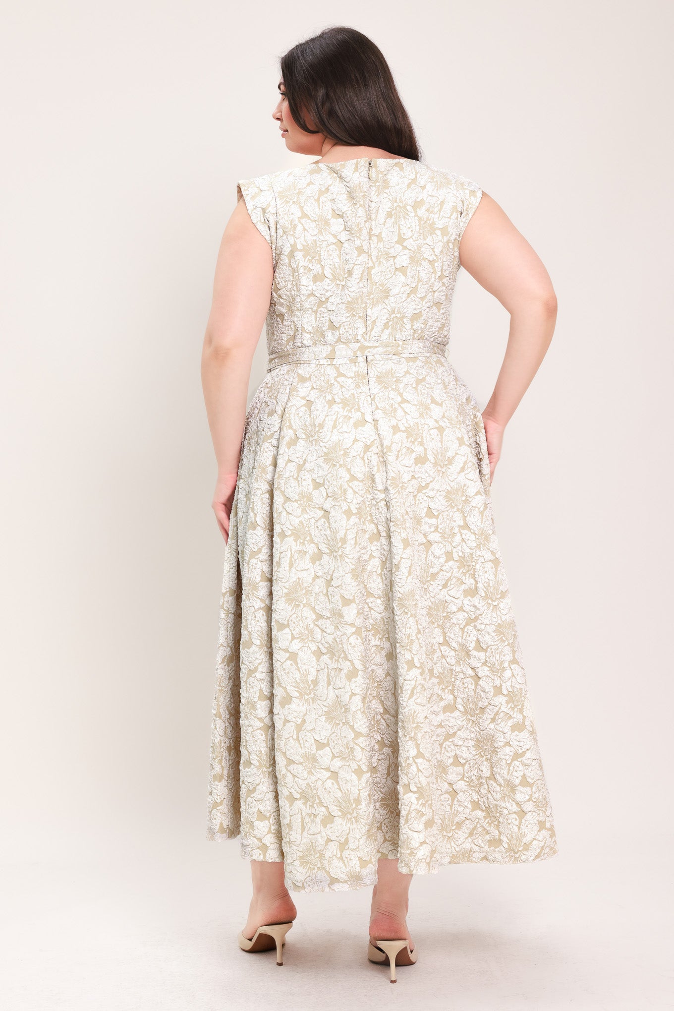 Woman wearing textured woven midi dress featuring wide neckline, sleeveless, self belt, full circle skirt and back zipper closure | FREEMARKET