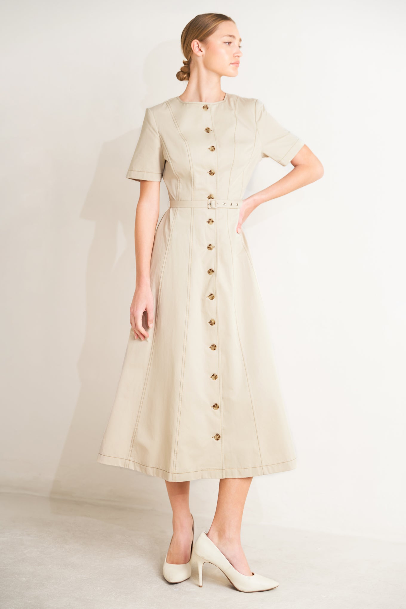 
A solid woven midi dress featuring round neckline, short sleeve, button down and circle skirt

Details:

Self : 100% Cotton

Size &amp; Fit

- Model is 5`8" And Wearing Size Small
- Measurements Taken From Size Small
- Approx. Length: 50"