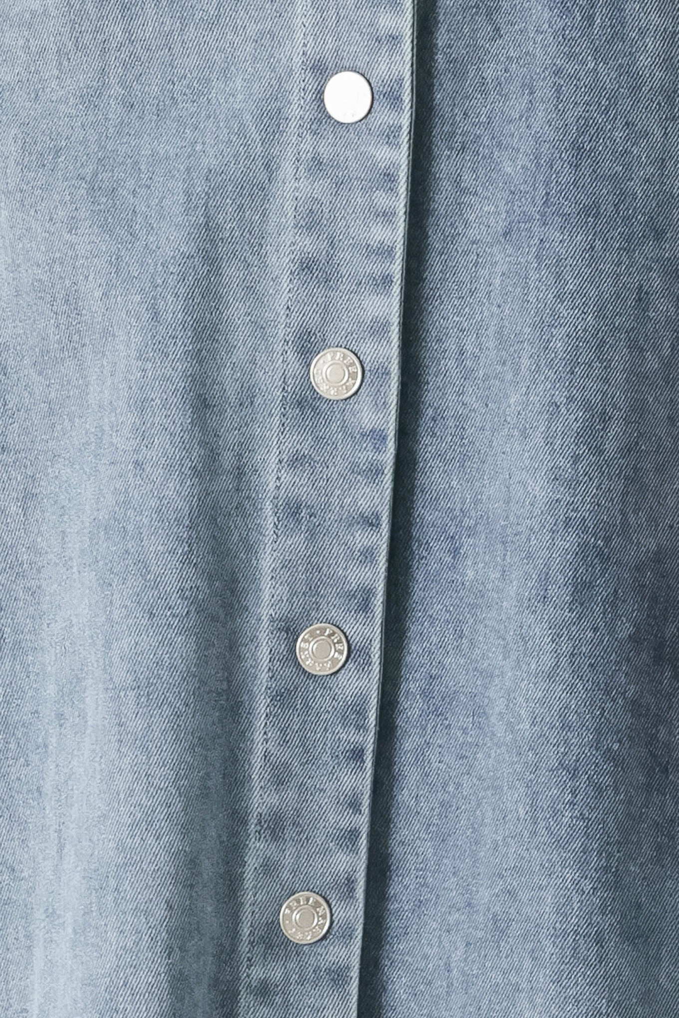 Close up of an acid washed denim midi dress featuring collar with V neck, cap sleeve, front button down, pockets and circle skirt | FREEMARKET