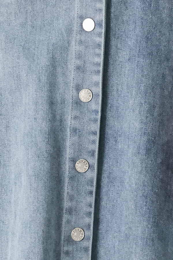 Close up of an acid washed denim midi dress featuring collar with V neck, cap sleeve, front button down, pockets and circle skirt | FREEMARKET