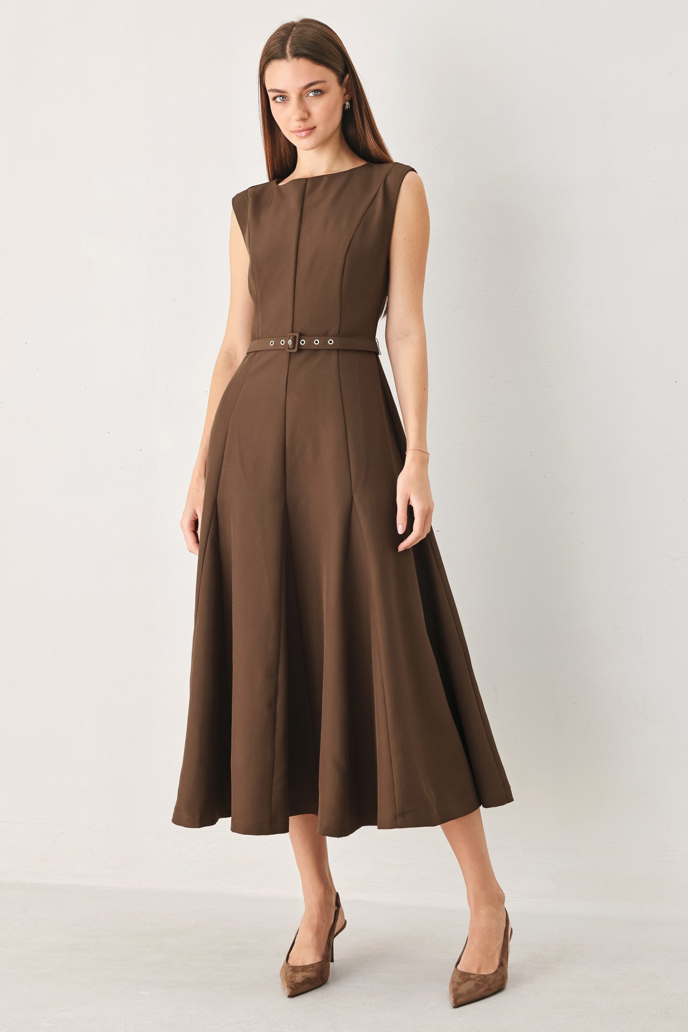 Woman wearing a brown woven midi dress featuring round neckline, sleeveless, self belt, full circle skirt and back zipper closure | FREEMARKET