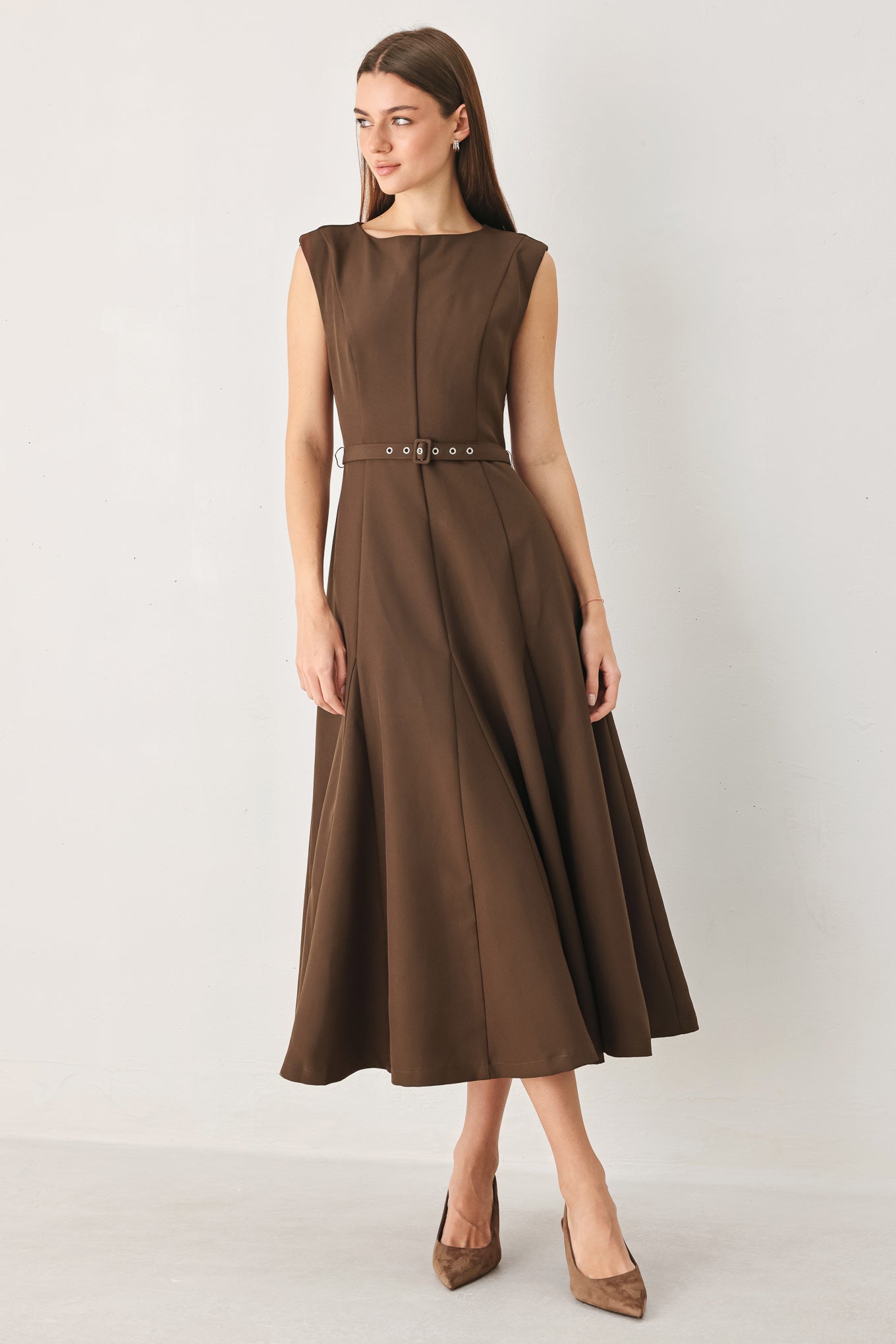 Woman wearing a brown woven midi dress featuring round neckline, sleeveless, self belt, full circle skirt and back zipper closure | FREEMARKET