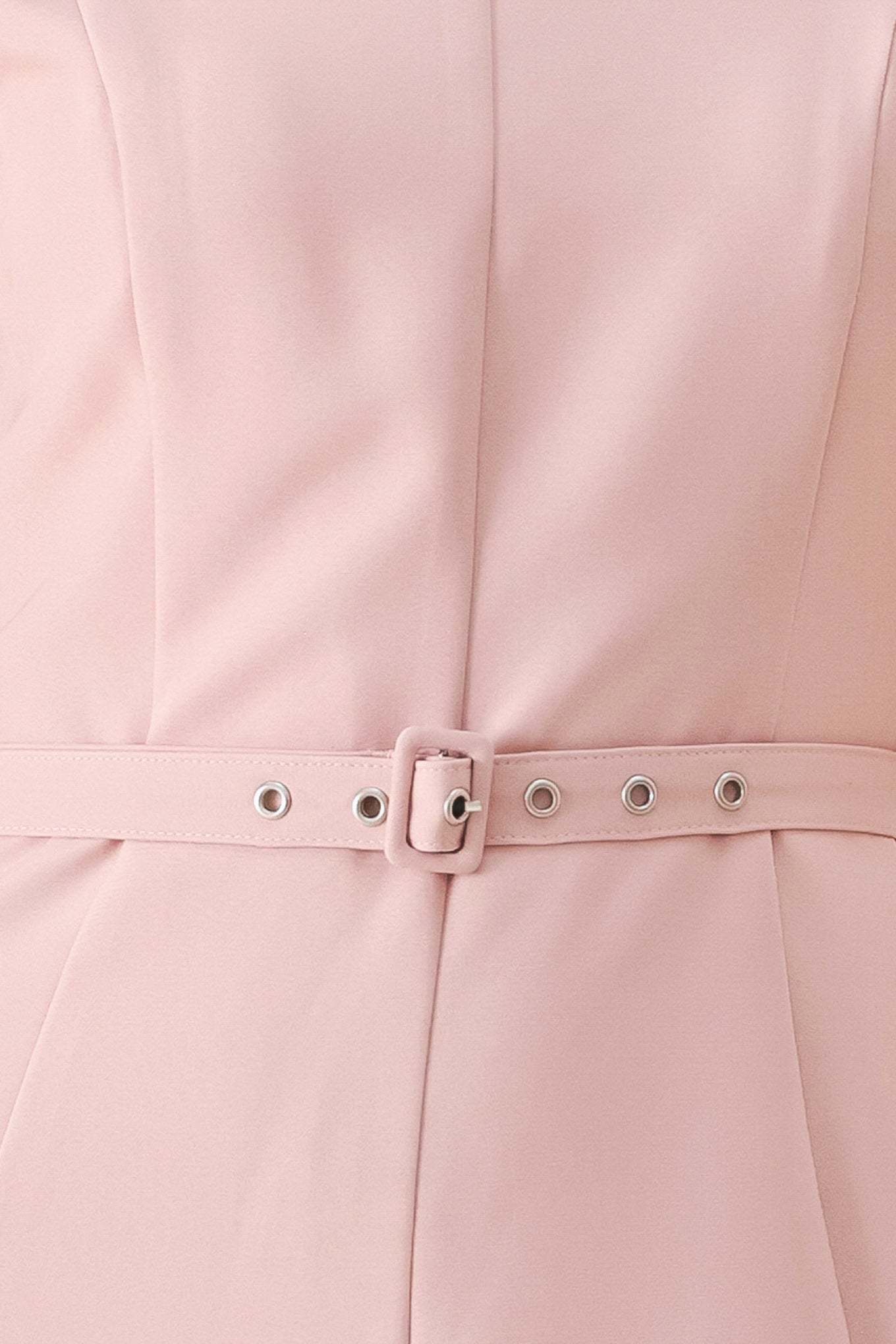 Close up of a pink midi dress featuring round neckline, sleeveless, self belt, full circle skirt and back zipper closure | FREEMARKET