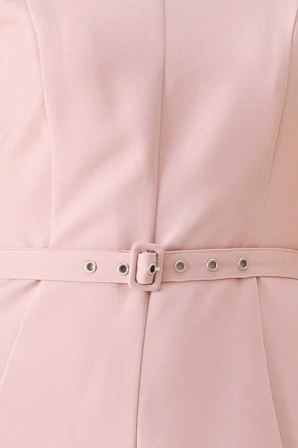 Close up of a pink midi dress featuring round neckline, sleeveless, self belt, full circle skirt and back zipper closure | FREEMARKET