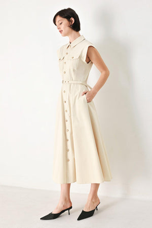 A solid woven shirt dress with front pocket, self belt and closure | FREEMARKET | Flying Tomato