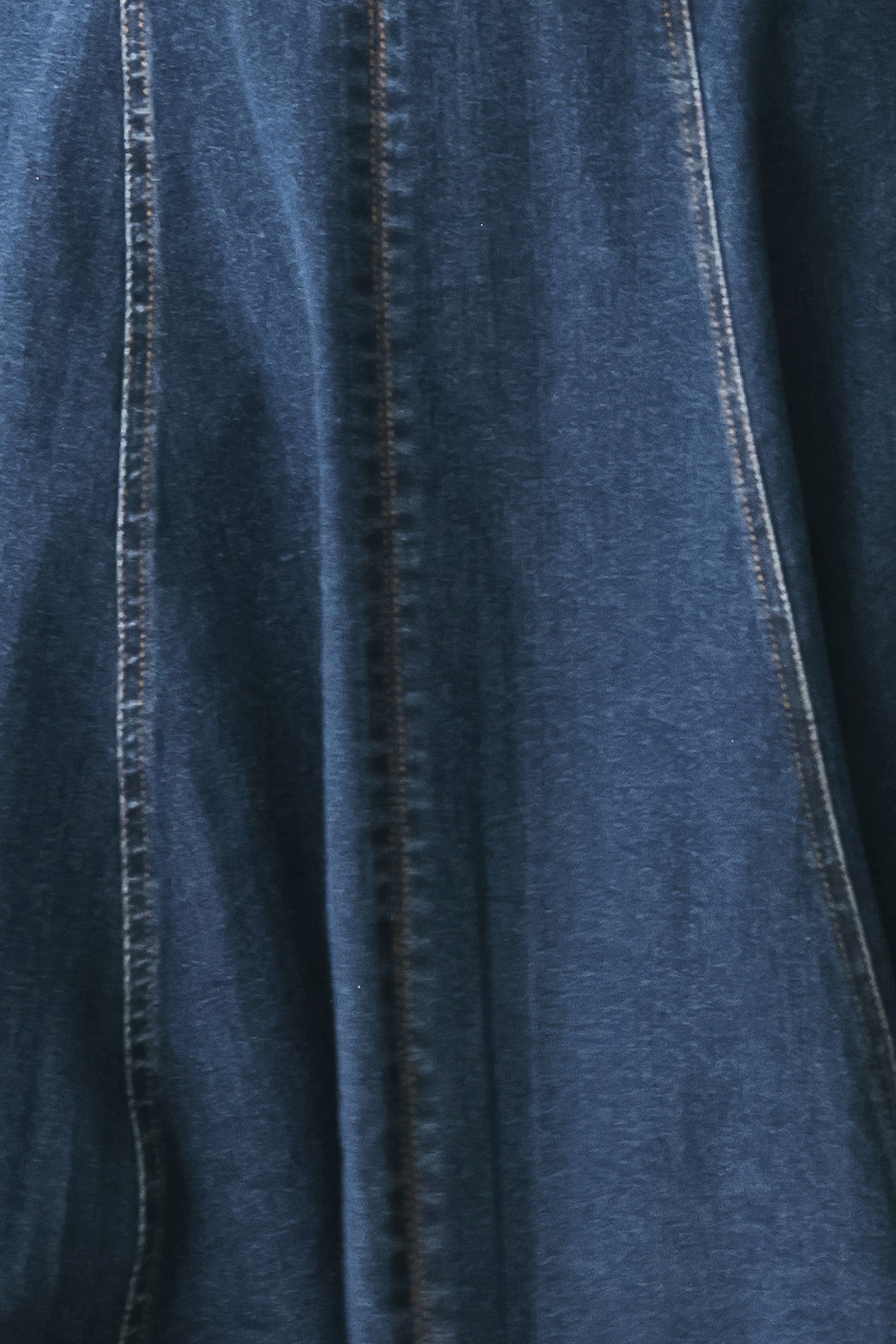Woman wearing a blue indigo denim midi dress featuring sweetheart neckline, straps, circle skirt and back zipper closure | FREEMARKET