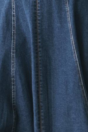 Woman wearing a blue indigo denim midi dress featuring sweetheart neckline, straps, circle skirt and back zipper closure | FREEMARKET