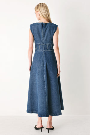 Woman wearing a blue denim midi dress featuring square neckline, corset waist, self belt, side pockets and back zipper closure | FREEMARKET