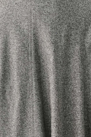 A woman modeling a sleeveless gray midi dress with a structured bodice, defined waist, and flared skirt | FREEMARKET