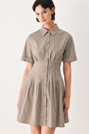 Woman wearing a multi colored taupe short sleeve striped woven mini dress with front button closure, corset waist and circle skirt | FREEMARKET