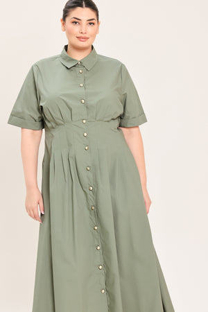 A woman modeling a olive green midi shirt dress with short sleeves, a button-down front, and a gathered waist | Plus Curve Flying Tomato
