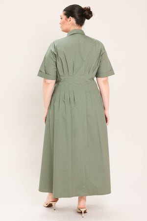 A woman modeling a olive green midi shirt dress with short sleeves, a button-down front, and a gathered waist | Plus Curve Flying Tomato