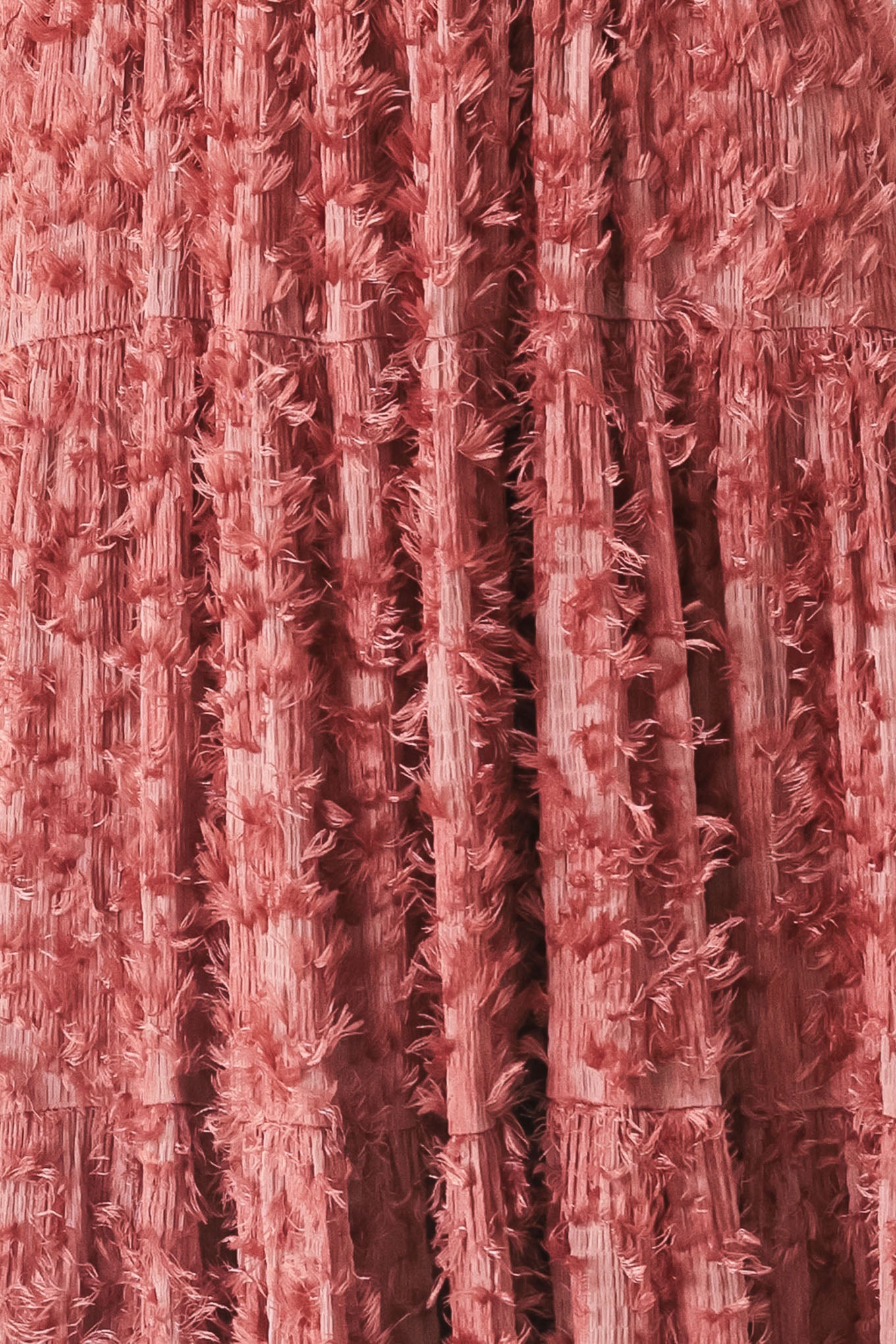 Close-up of textured pink fabric with a woven pattern | FREEMARKET