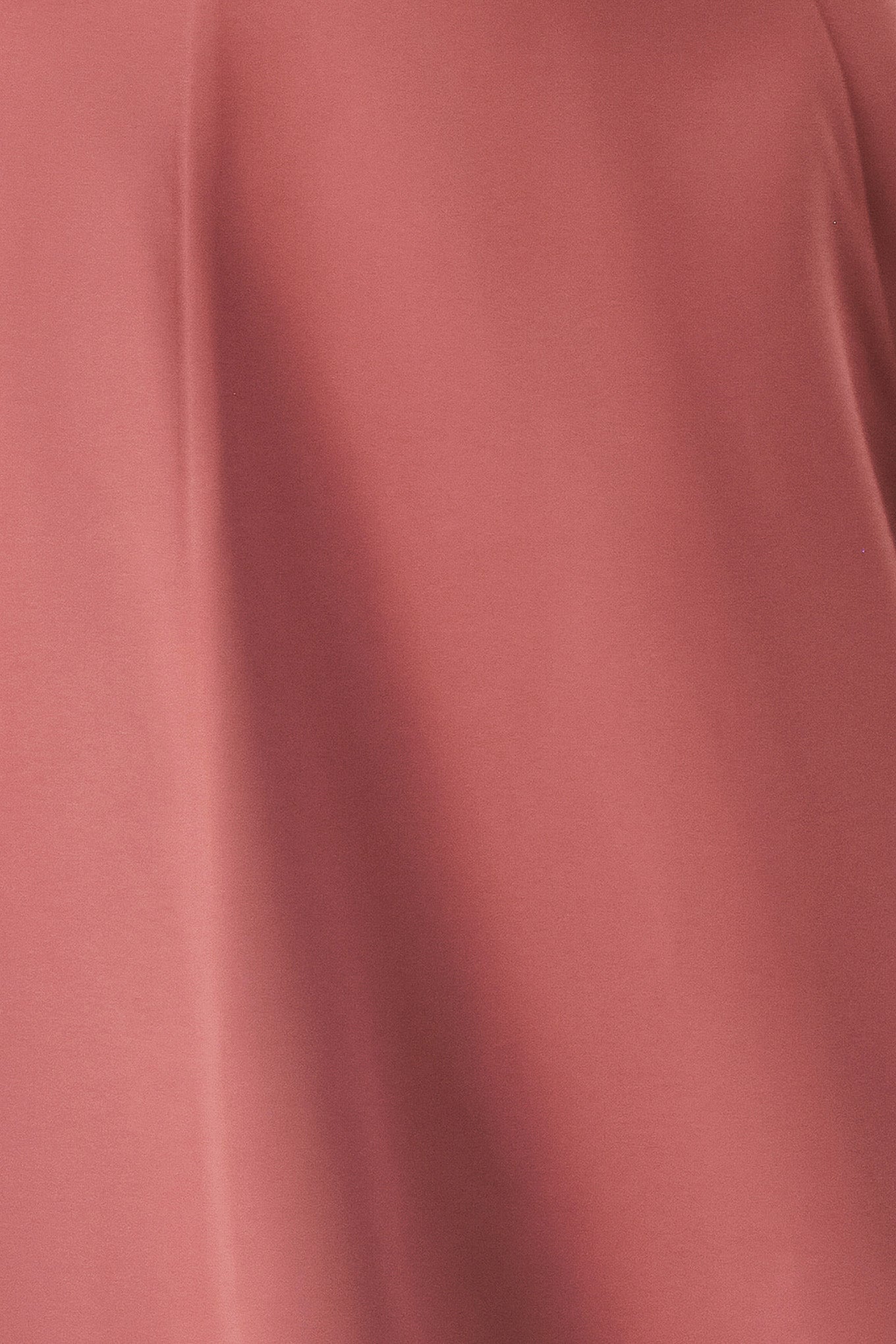 Woman wearing a rose pink midi dress with cut-out design featuring cam top, cut out at waistline, self belt, circle skirt and back zipper closure | FREEMARKET