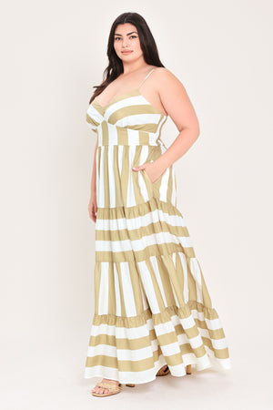 Woman wearing a taupe and white striped maxi dress | FREEMARKET Curve